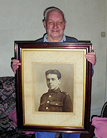 Harry Barron Harry Baron from Chorley holding a picture of his father in uniform.